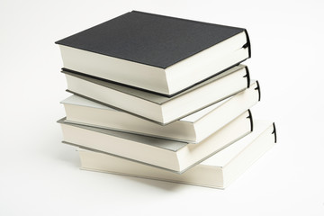 A Disarrayed Stack OF Cloth Bound Books