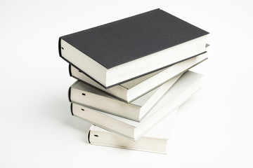 A Disarrayed Stack OF Cloth Bound Books
