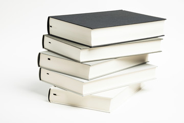 A Disarrayed Stack OF Cloth Bound Books