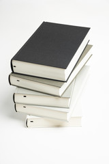 A Disarrayed Stack OF Cloth Bound Books