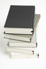 A Disarrayed Stack OF Cloth Bound Books
