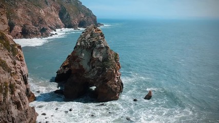 Aerial view from a rocky wild beach with amazing rocks. Atlantic coastine, Portugal. Drone view