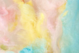 Sweet colorful cotton candy as background, closeup view