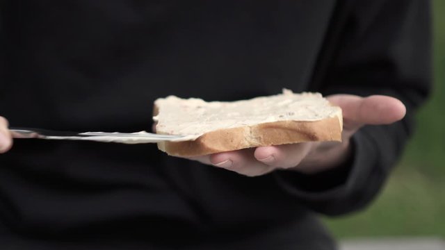Lockdown Close-up: Woman Putting Spread on Bread Preparing a Sandwich - Smaland, Sweden