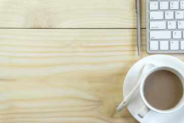 Office desk with copy space. Digital devices wireless keyboard on office table with notepad,you can apply to your product.