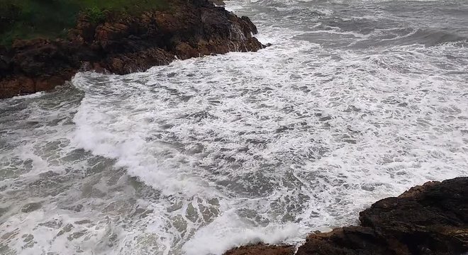 The breaking of the waves at the cliffs of the cantabrian coast, Comillas, Spain	
