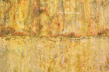 Detail of broken rusty corroded metal wall. Metal texture background