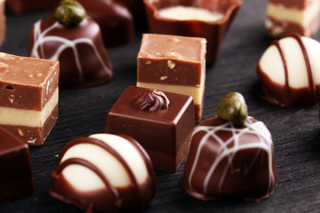 a lot of variety chocolate pralines, belgian confectionery gourmet chocolate.