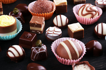 a lot of variety chocolate pralines, belgian confectionery gourmet chocolate.