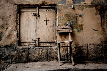 Chair on a wall in the Coptic cemetery in Cairo