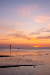 Zelfklevend Fotobehang waddenzee or wadd sea during sunset seen from jetty of ameland ferry © ahavelaar