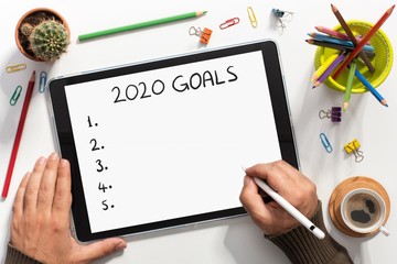 To Do list For New Year 2020, Over Head View Of Work Desk.