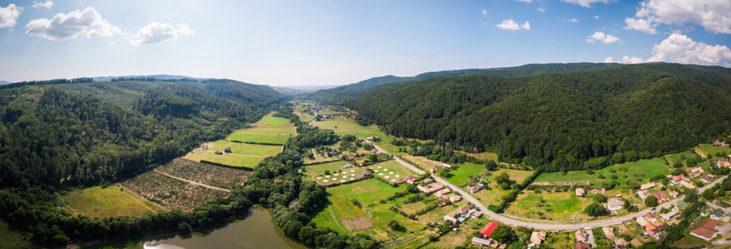 Aerial drone shot of Campu Cetatii town in the mountains