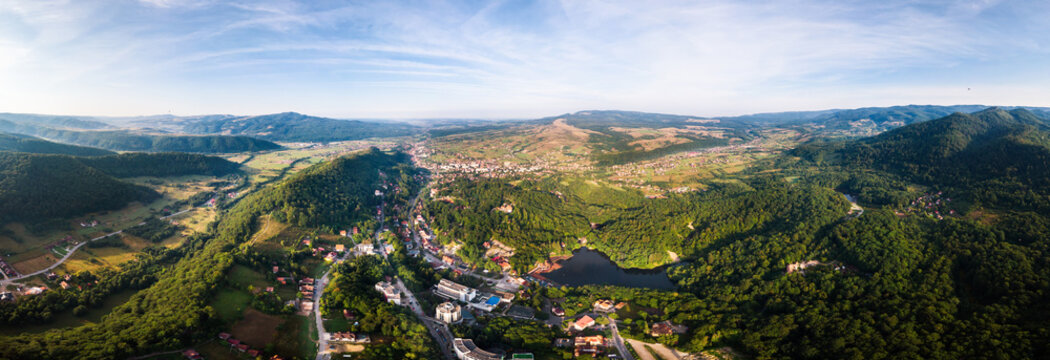 Aerial panoramic drone shot of Sovata city with Ursu Lake