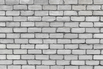 Photo texture of an old white brick wall