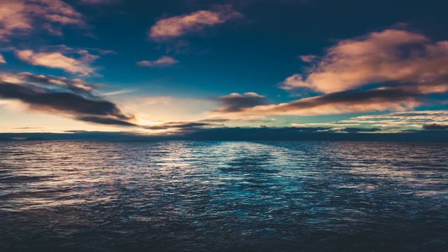 Ocean with floating clouds in sky and shadows reflecting on rippling water in early morning. 3D Concept travel, majestic landscape, beauty world, holidays. Slow motion, parallax, time lapse 4K