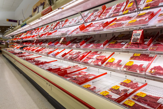MADISON, NJ, UNITED STATES - FEBRUARY 13, 2014: Meat aisle in an American supermarket. The meat industry in the US is a powerful political force, both in the legislative and the regulatory arena.