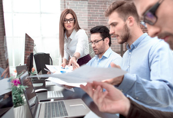 businessman throws financial documents