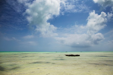 Fototapeta premium Wooden Fishing Boat at Tropical Beach in Zanzibar Island ,Tanzania