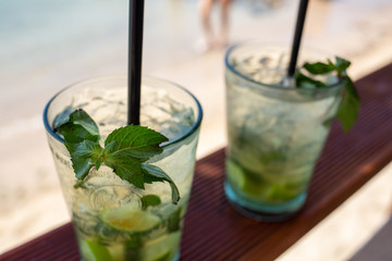 mojito cocktail on a green background