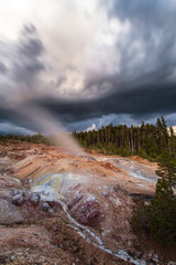 sunset at a geyser in yellowstone