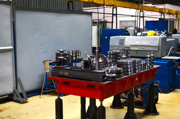 Workshop of a automotive factory for the production of automotive gear, spare parts and components. Production of gears for automobile gearboxes for trucks. Small sharpness, possible granularity