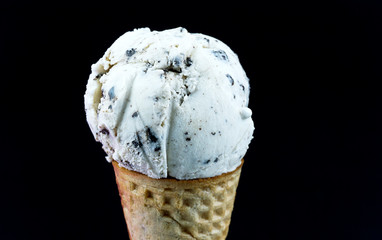 Closeup ice cream scooped in waffle cone on pink background, Closeup Front view Food concept..