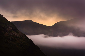 Fototapeta na wymiar Sunrise over mountain ridge in Lake District, UK