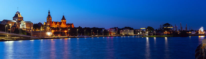 Szczecin. A night panorama of the city located on the banks of the Odra River - obrazy, fototapety, plakaty