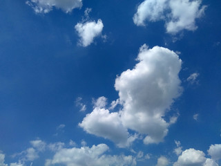 Obraz na płótnie Canvas clouds sky blue air nature spring summer freedom flight