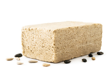 Halva with sunflower seeds closeup on a white. Isolated