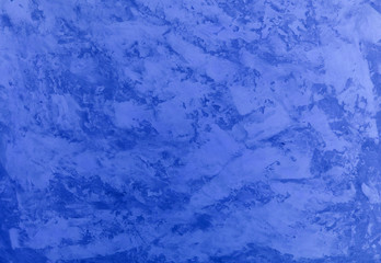 The texture of the textured wall is blue. Stylized textural banner with space for text.