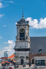 Clock tower at Athenee Robert Catteau building in Brussels, Belgium.