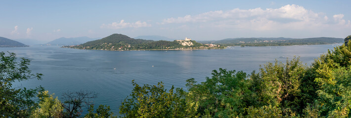 Stunning panoramic view of the southern part of Lake Maggiore on a sunny day, Italy
