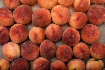Fresh ripe peaches close-up. Wallpaper, background. Fruit season
