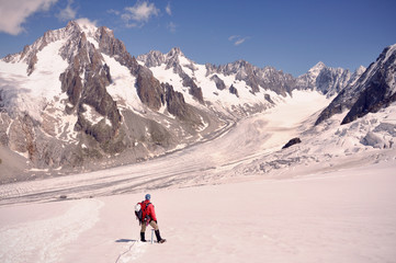 Fototapeta na wymiar Glacier walking on the ice in Alps