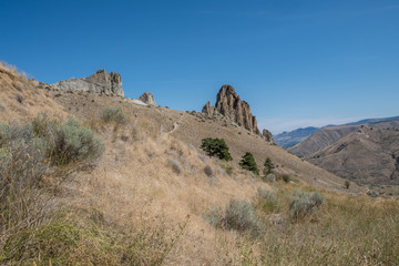 View of Saddle Rock Wenatchee hike from base of foothill