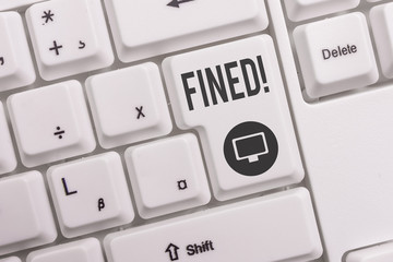 Text sign showing Fined. Business photo text clarify beer by causing precipitation of sediment during production White pc keyboard with empty note paper above white background key copy space