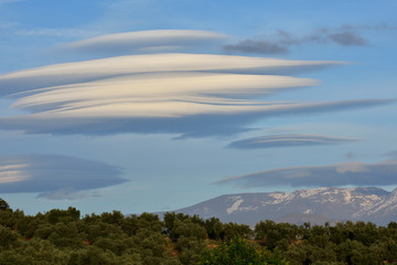 lenticular clouds over Sierra Nevada