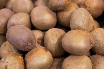 Kiwi exotic fruit macro, close-up. Texture or background for recepies or agriculture purpose