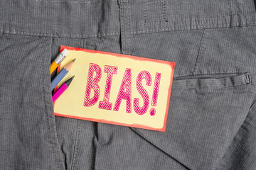 Conceptual hand writing showing Bias. Concept meaning inclination or prejudice for or against one...