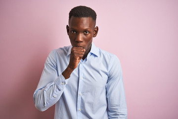 African american man wearing blue elegant shirt standing over isolated pink background feeling unwell and coughing as symptom for cold or bronchitis. Healthcare concept.