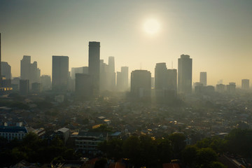 Air polluted Jakarta downtown at morning time