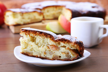 Classic American apple pie. Piece of tasty Organic Apple Pie and cup with espresso coffee. Dessert Ready to Eat.