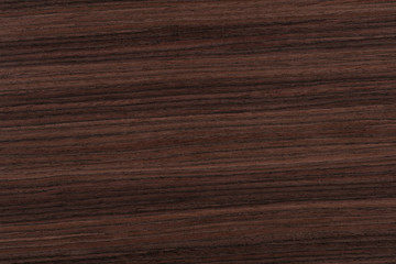 Contrast rosewood veneer background in dark color. High quality