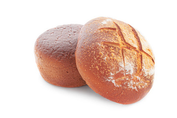 Side view of two loaves of fresh tasty ruddy bread with crisp isolated on a white background