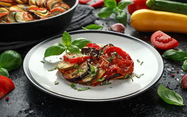 Ratatouille Vegetable Stew with zucchini, eggplants, tomatoes, garlic, onion and basil. Traditional French food.