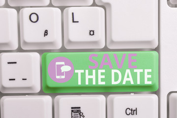 Writing note showing Save The Date question. Business concept for asking someone to remember specific day or time Keyboard with note paper on white background key copy space