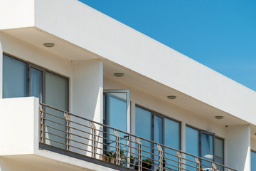 Modern apartment buildings on a sunny day with a blue sky. Facade of a modern apartment building