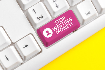 Writing note showing Stop Wasting Money. Business concept for advicing demonstrating or group to start saving and use it wisely White pc keyboard with note paper above the white background